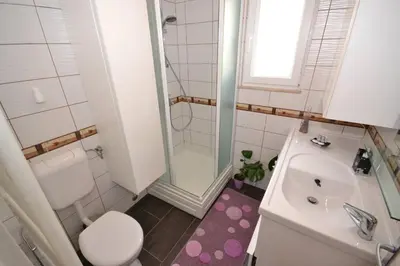 Kupaonica u objektu Villa Magalia