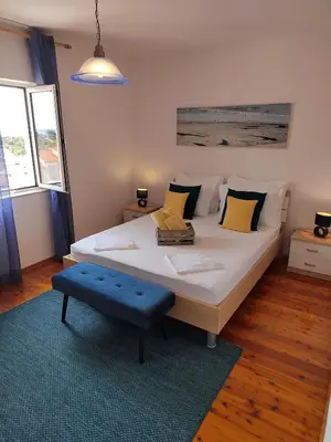 Krevet ili kreveti u jedinici u objektu Apartments Marina