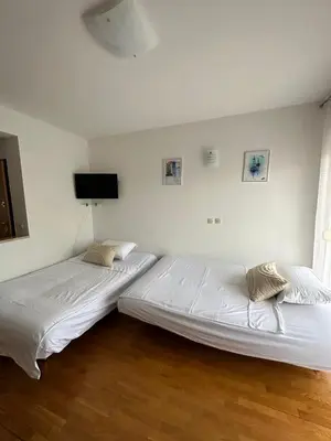 Krevet ili kreveti u jedinici u objektu Apartment Bella with free parking