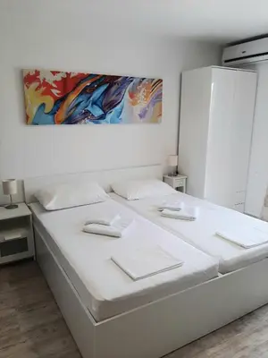Krevet ili kreveti u jedinici u objektu Apartman i soba Nina