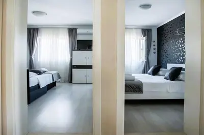 Krevet ili kreveti u jedinici u objektu Apartment Kerum Plus Rooftop with Intex Pure Spa