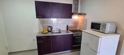 Kuhinja ili čajna kuhinja u objektu Apartments Ana i Ante Punta