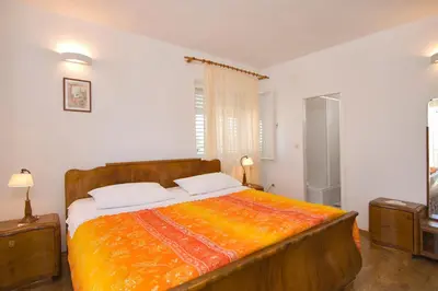 Krevet ili kreveti u jedinici u objektu Villa Lukrecia - Stone Villa with Pool & Sea Views I Supetar, Brač