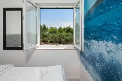 Krevet ili kreveti u jedinici u objektu Sunrise Apartment Hvar