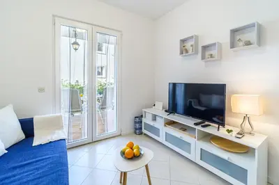 TV i/ili zabavni centar u objektu Lexi Apartment - Charme Holidays