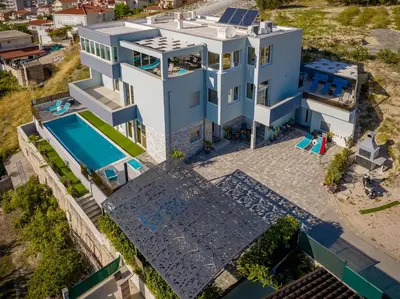 Bazen u objektu Apartman Oliva and Studio Delux for a family with swiming pool, free parking, terace with view at the sea ili u blizini