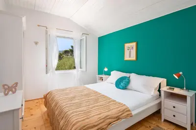 Krevet ili kreveti u jedinici u objektu Holiday Home Dora