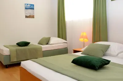 Krevet ili kreveti u jedinici u objektu Holiday apartments Lidija