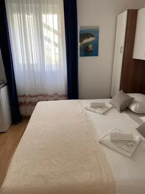 Krevet ili kreveti u jedinici u objektu Holiday apartments Lidija