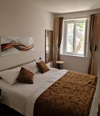Krevet ili kreveti u jedinici u objektu Old Town Apartment