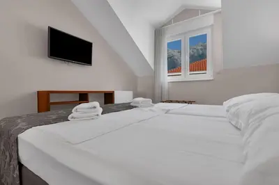 Krevet ili kreveti u jedinici u objektu Brotis - Apartment with sea view - Makarska Exklusiv