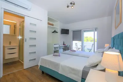 Krevet ili kreveti u jedinici u objektu Stella Maris Hvar - Sea View Rooms with Balcony