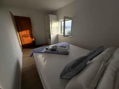Krevet ili kreveti u jedinici u objektu Apartment Kuman
