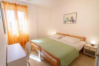Krevet ili kreveti u jedinici u objektu Cozy 1 bedroom apt/terrace/garden