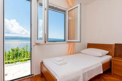 Krevet ili kreveti u jedinici u objektu Apartments Marino