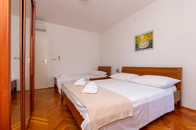 Krevet ili kreveti u jedinici u objektu Apartments Marino