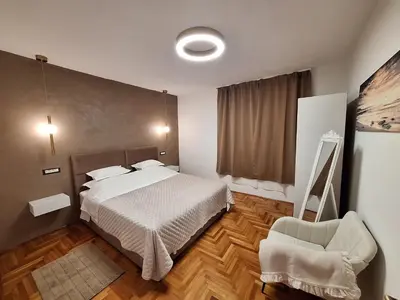 Krevet ili kreveti u jedinici u objektu Apartman K. & M. KOLUMBIĆ