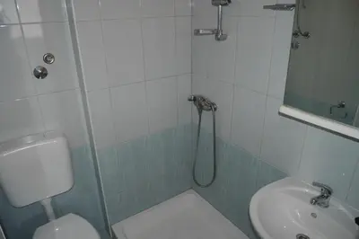 Kupaonica u objektu Apartment in Dugi Rat with sea view, balcony, air conditioning WiFi 5132-1