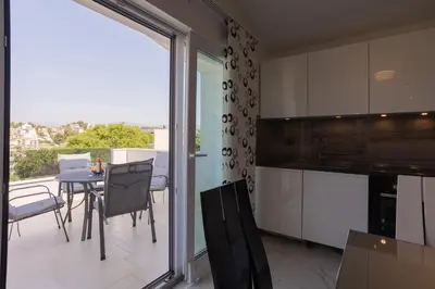 Kuhinja ili čajna kuhinja u objektu Apartment Tomo