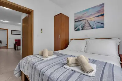 Krevet ili kreveti u jedinici u objektu Apartments Harmony of Five