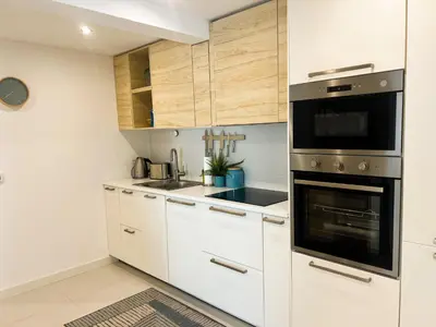 Kuhinja ili čajna kuhinja u objektu VILLA ONEUM - Apartment MARE with privat JACUZZI