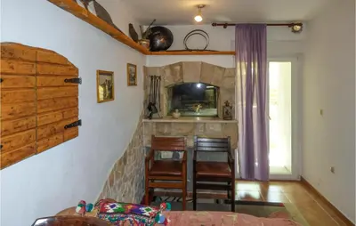 Kuhinja ili čajna kuhinja u objektu Lovely Apartment In Omis With House Sea View