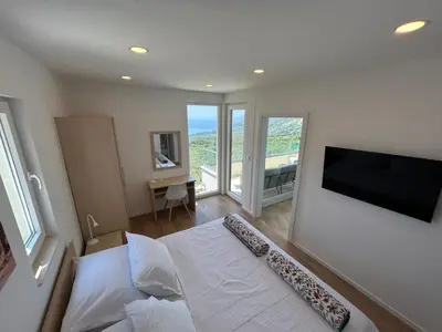 TV i/ili zabavni centar u objektu Villa in a quiet area - Private Pool - Sport - Starlink - BBQ