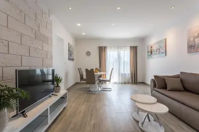 TV i/ili zabavni centar u objektu Apartments Biserka