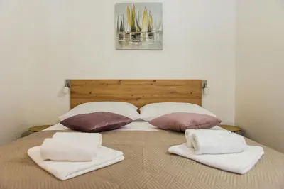 Krevet ili kreveti u jedinici u objektu Beach Lavica Premium Apartments Oasis of peace