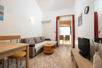 TV i/ili zabavni centar u objektu Beach Lavica Premium Apartments Oasis of peace