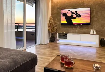 TV i/ili zabavni centar u objektu Apartman 7