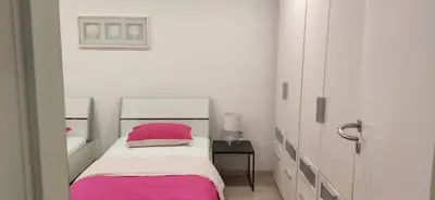Krevet ili kreveti u jedinici u objektu Apartments Armonia
