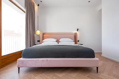 Krevet ili kreveti u jedinici u objektu Villa Dattero -private Pool, Jacuzzi, Sauna, Media room