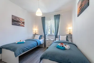 Krevet ili kreveti u jedinici u objektu SeaView Apartment Toni