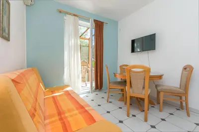 TV i/ili zabavni centar u objektu Apartments Mate