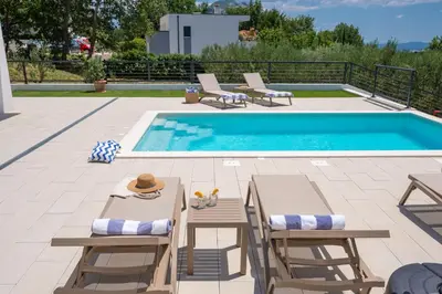 Bazen u objektu Villa Nacle with Heated Pool and Large Playground near Omis and Split ili u blizini