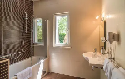 Kupaonica u objektu Villa Gumonca