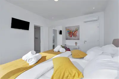 Krevet ili kreveti u jedinici u objektu Villa Skyview mit Infinitypool und Panorama Meerblick