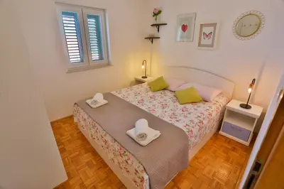 Krevet ili kreveti u jedinici u objektu Apartments Trešnja