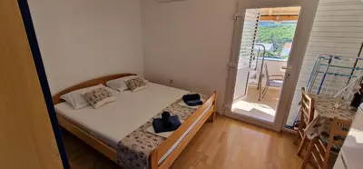 Krevet ili kreveti u jedinici u objektu Apartmani Dutković
