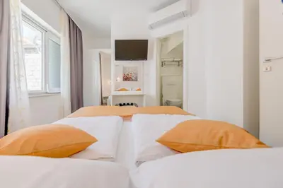 Krevet ili kreveti u jedinici u objektu Apartments Villa Tudor 1
