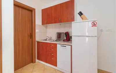 Kuhinja ili čajna kuhinja u objektu Apartment Supetar 44