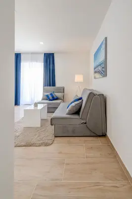 Krevet ili kreveti u jedinici u objektu Apartments Villa Tudor 2