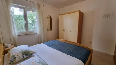 Krevet ili kreveti u jedinici u objektu Three-Bedroom Apartment close to the Omis beach