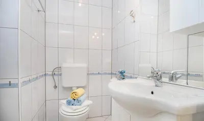 Kupaonica u objektu Apartments Jurić