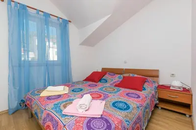Krevet ili kreveti u jedinici u objektu Apartments Jerka
