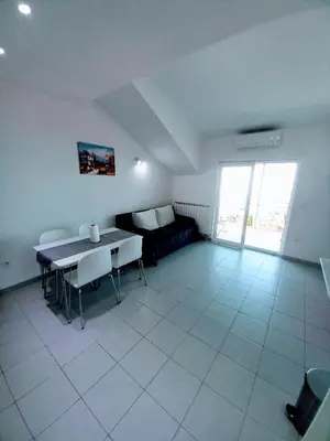 TV i/ili zabavni centar u objektu Apartments Berti