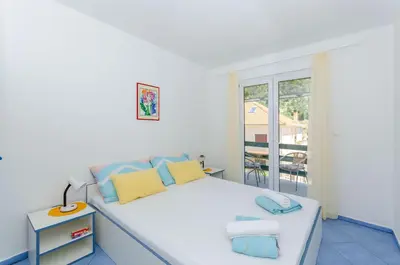 Krevet ili kreveti u jedinici u objektu Apartments Vidoni