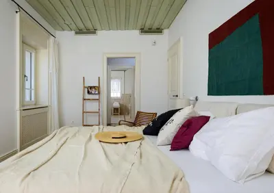 Krevet ili kreveti u jedinici u objektu Elegant Brac Villa 4 Bedrooms Villa Shoreline Serenity Stunning Sea Views