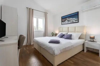 Krevet ili kreveti u jedinici u objektu Seafront Villa Azzurro with heated pool